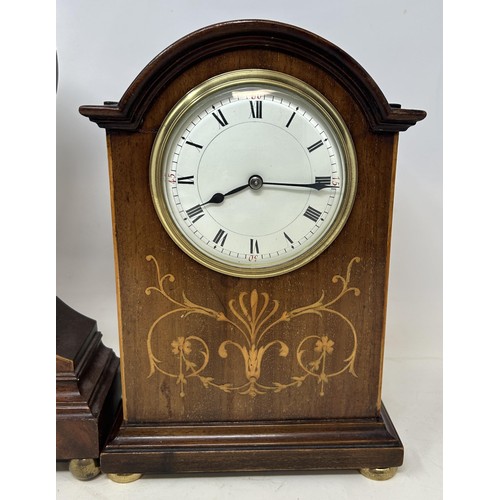 558 - A mantel clock, in a mahogany case, 28 cm high, and another (2)