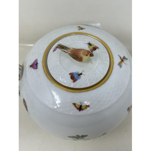 592 - An Herend porcelain tea pot, decorated birds, 17 cm high