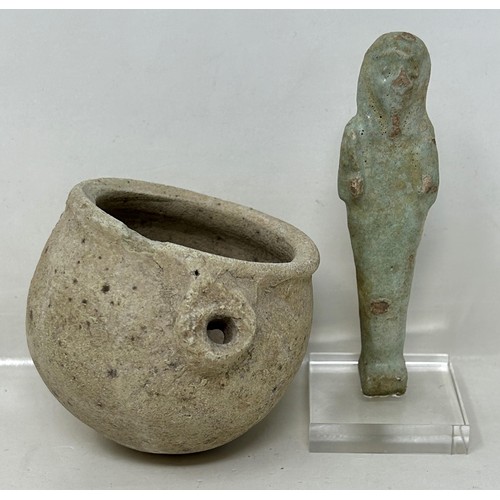 593 - An Egyptian Ushabti style figure, 10 cm high, and a Roman style stoneware pot (2)