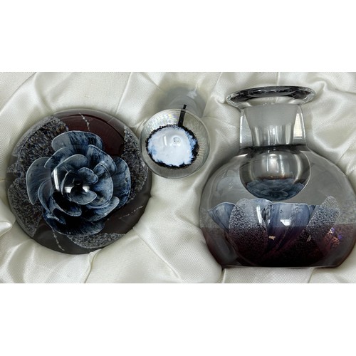 597 - A Caithness Blue Rose limited edition glass paperweight, and matching perfume bottle, No 35, with ce... 