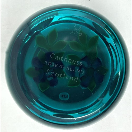 600 - A William Manson limited edition glass paperweight, and another (2)