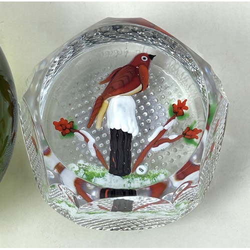 605 - A William Manson limited edition glass paperweight,  80/650, and another, 14/150 (2)