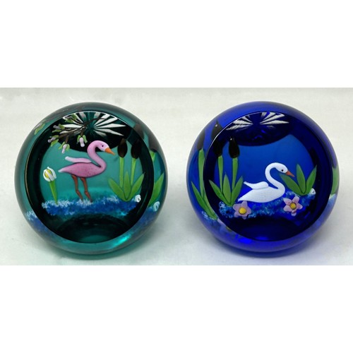 611 - A Caithness glass paperweight, boxed, and another (2)