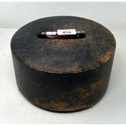 614 - A set of 1920s gaming counters, in stained wood holder with silver plated handle