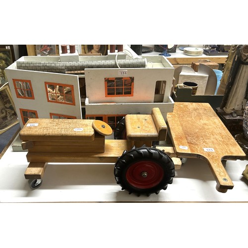 535 - A 1950s dolls house, 70 cm wide, a wooden tractor, and a trailer (3)