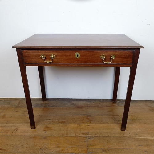 662 - A 19th century mahogany side table, with a single drawer, on square legs, 90 cm wide