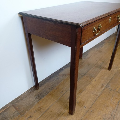 662 - A 19th century mahogany side table, with a single drawer, on square legs, 90 cm wide