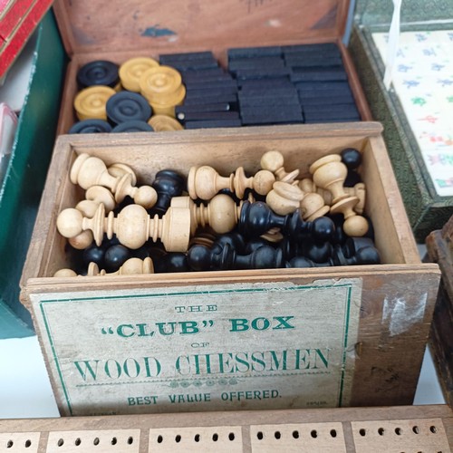 616 - A chessboard, in the form of a book, a mahogany box, assorted playing cards and game tokens (box)