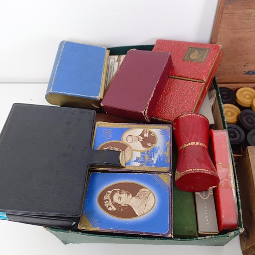 616 - A chessboard, in the form of a book, a mahogany box, assorted playing cards and game tokens (box)