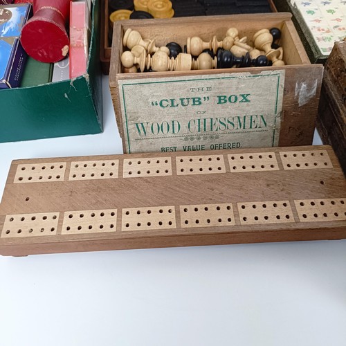 616 - A chessboard, in the form of a book, a mahogany box, assorted playing cards and game tokens (box)