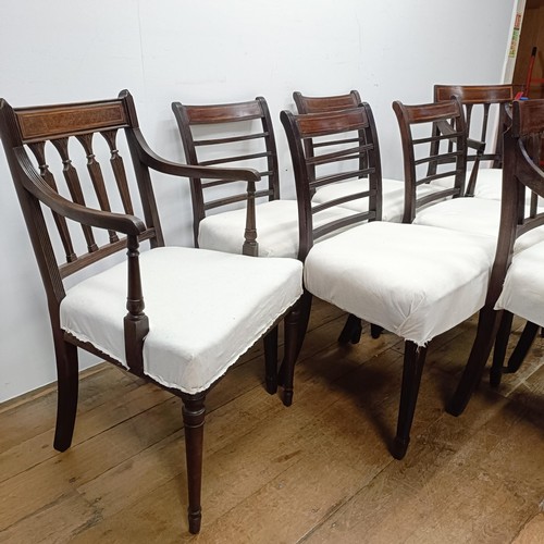 673 - A set of four mahogany rail back dining chairs, and three armchairs (7)