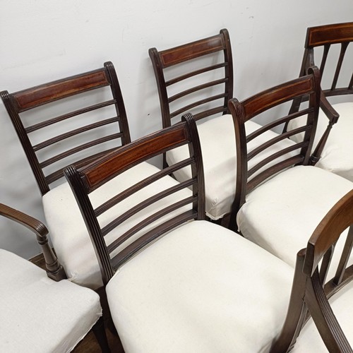 673 - A set of four mahogany rail back dining chairs, and three armchairs (7)