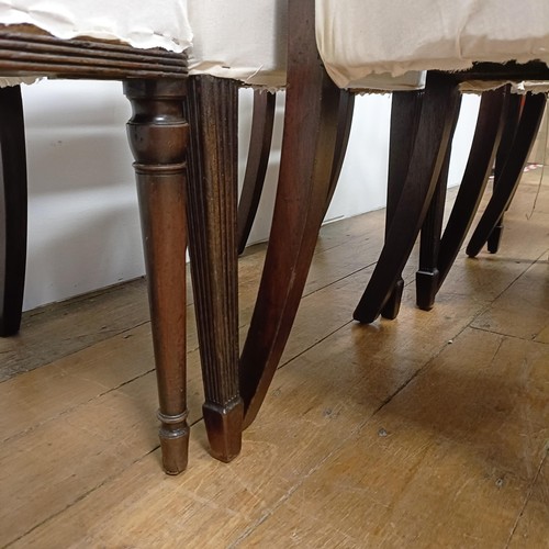 673 - A set of four mahogany rail back dining chairs, and three armchairs (7)