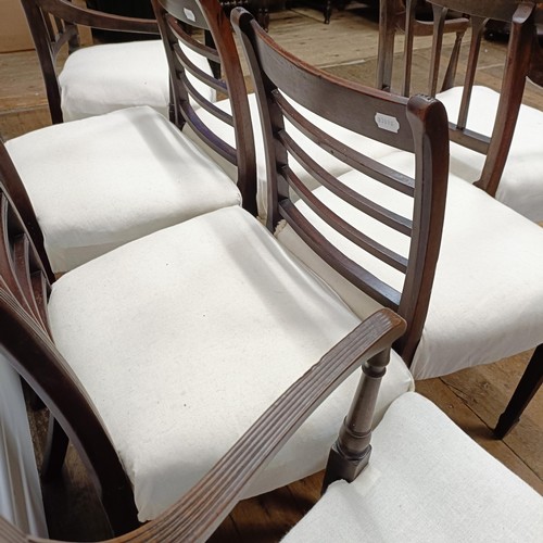 673 - A set of four mahogany rail back dining chairs, and three armchairs (7)