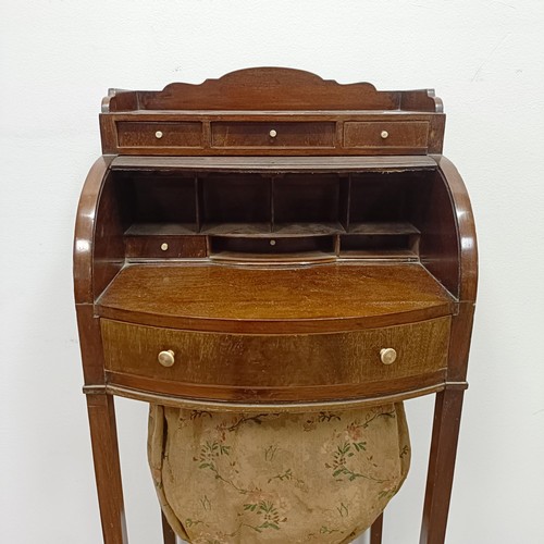 691 - A ladies mahogany tambour fronted writing desk/work table, 40 cm wide