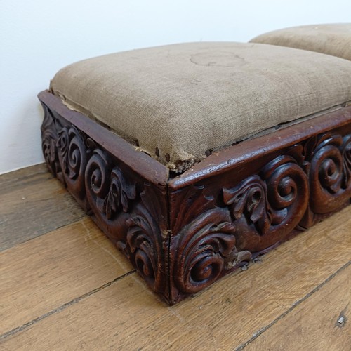 712 - A pair of country house carved oak footstools, 37 cm wide (2)