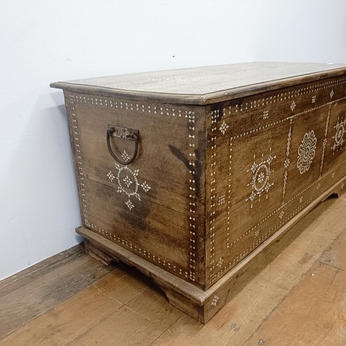 714 - A Zanzibar type trunk, 100 cm wide, a single chair, and a coffee table (3)