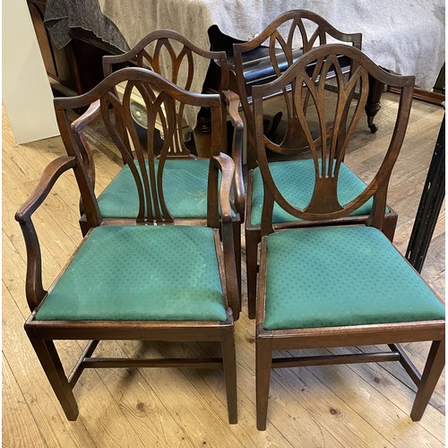 644 - A mahogany Sutherland table, 110 cm wide,  a painted bookcase, and four chairs (6)