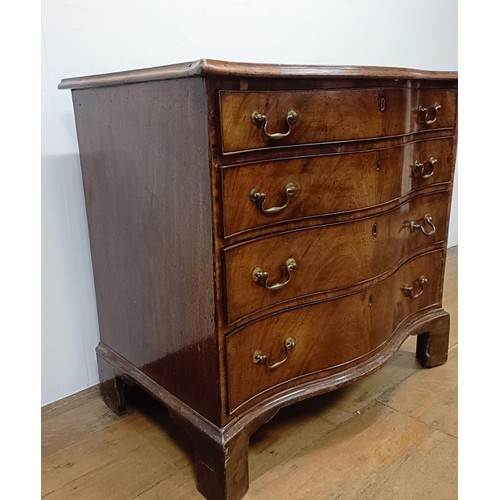 719 - A 19th century mahogany serpentine front chest, having four graduated drawers, on bracket feet, 92 c... 