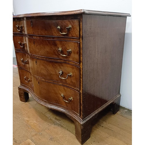 719 - A 19th century mahogany serpentine front chest, having four graduated drawers, on bracket feet, 92 c... 