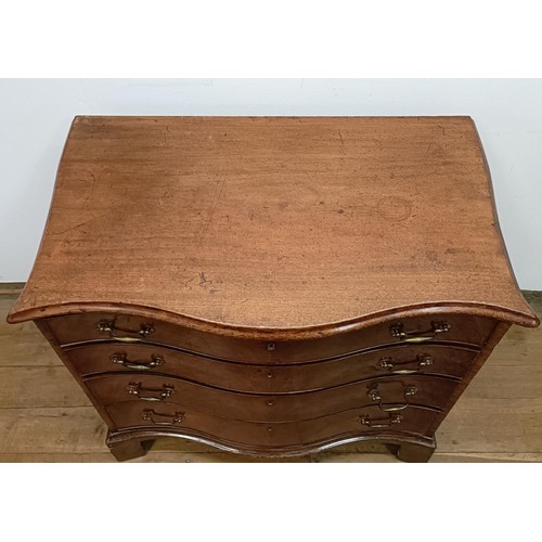 719 - A 19th century mahogany serpentine front chest, having four graduated drawers, on bracket feet, 92 c... 