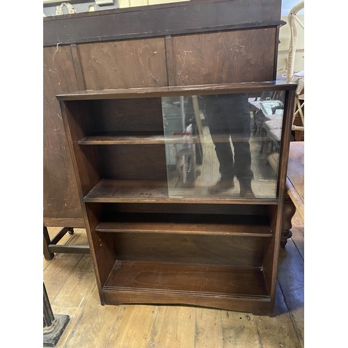 643 - An oak corner cabinet, 70 cm wide, two bookcases, a pair of bedside chests, and assorted other furni... 