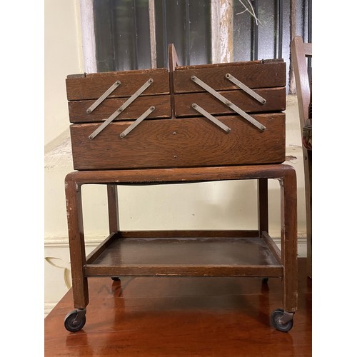 701 - A mahogany side table, with a single drawer, 77 cm wide, a child's school desk, a magazine rack, a m... 