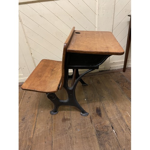 701 - A mahogany side table, with a single drawer, 77 cm wide, a child's school desk, a magazine rack, a m... 