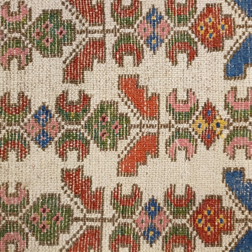 734 - A Persian type rug, 175 x 135 cm, a Chinese rug, 160 x 92 cm, and a Chinese carpet, 215 x 140 (3)