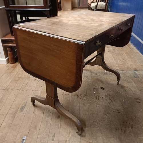 766 - A mahogany sofa table, with a reversible games top, inset with chess and backgammon board, 100 cm wi... 