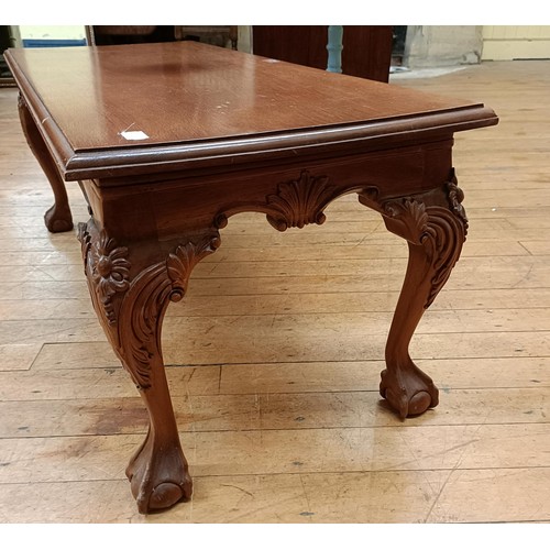 769 - A mahogany low table, on carved cabriole legs with claw and ball feet, 107 cm wide