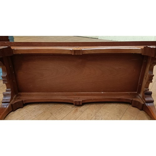 769 - A mahogany low table, on carved cabriole legs with claw and ball feet, 107 cm wide