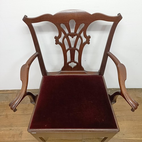 799 - A 19th century Chippendale style mahogany commode armchair