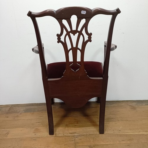 799 - A 19th century Chippendale style mahogany commode armchair