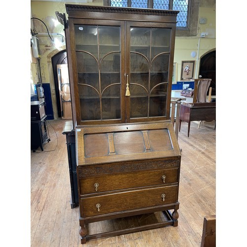 793 - An oak bureau bookcase, a pine chest, a corner cupboard, a faux log burner, a kitchen table, a red g... 