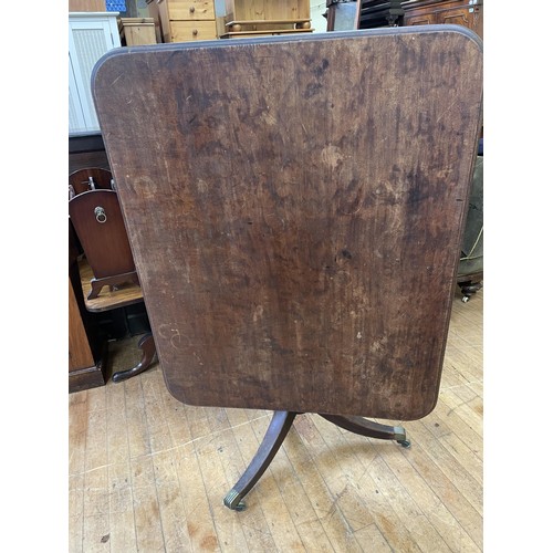 771 - A mahogany tilt top breakfast table,  the top 103 x 90 cm, a commode chair, and a dining table (3)