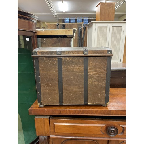 772 - A mahogany chiffonier, 107 cm wide, a trunk, a standard lamp, a magazine rack, a wine table, a side ... 