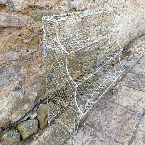 814 - A painted wirework plant stand