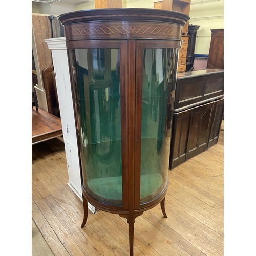 774 - An Edwardian mahogany bow front display cabinet, 77 cm wide