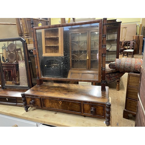 638 - A mahogany bedroom mirror, the base with three drawers,  68 cm wide, and another, 40 cm wide (2)