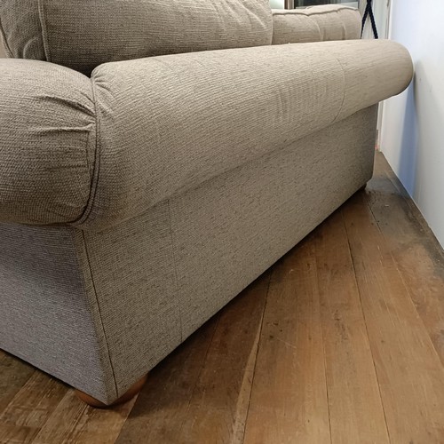 659 - A grey upholstered sofa, 210 cm