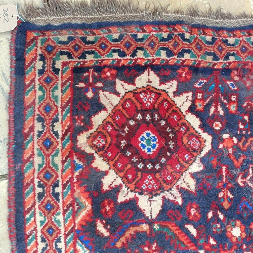 743 - A Persian blue ground carpet, 282 x 204  cm