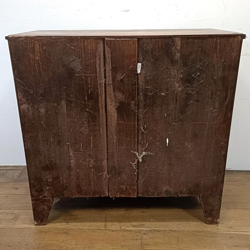 667 - A mahogany bow front chest, having a brushing slide above three drawers, 93 cm wide