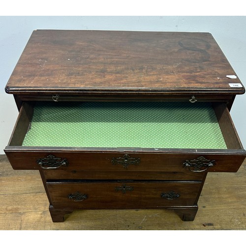 749 - A 19th century mahogany chest, having a brushing slide above four graduated drawers, 75 cm wide