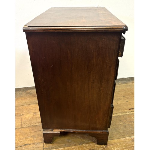 749 - A 19th century mahogany chest, having a brushing slide above four graduated drawers, 75 cm wide