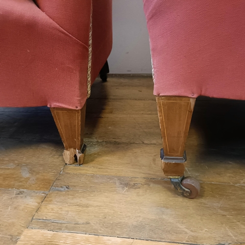 634 - A pair of tub armchairs, on mahogany legs (2)