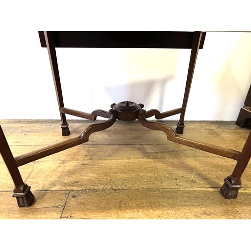 750 - A George III mahogany Pembroke table, on square chamfered legs, united by an X frame, 76 cm wide