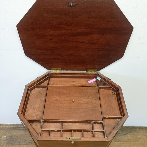 727 - A 19th century mahogany worktable, the hinged top to reveal a fitted interior, 53 cm wide