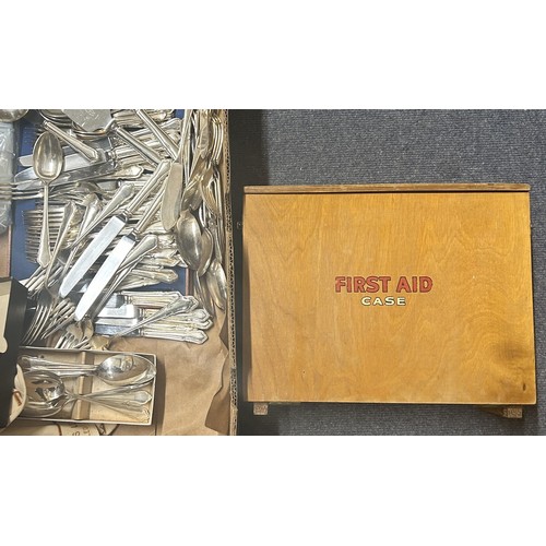 589 - A vintage first aid kit and contents, assorted silver plate cutlery and flatware, and other items (q... 