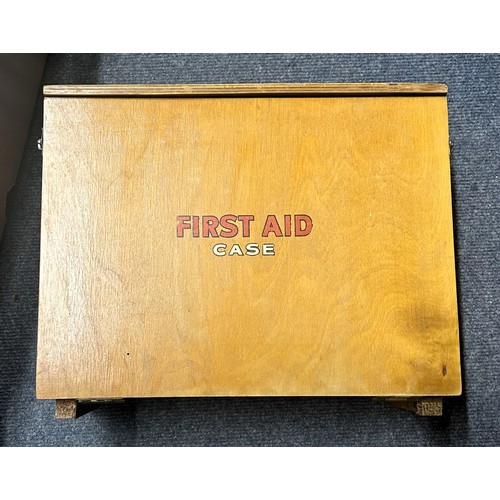 589 - A vintage first aid kit and contents, assorted silver plate cutlery and flatware, and other items (q... 